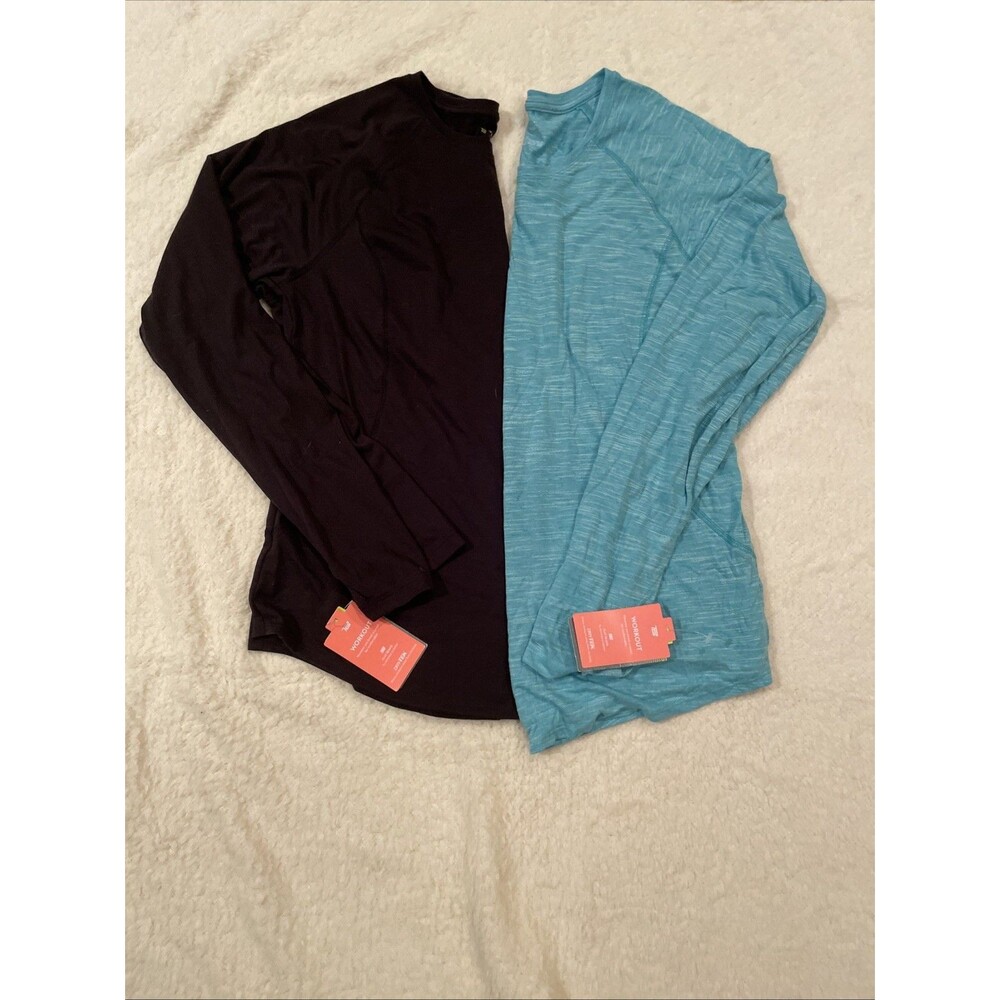 Two womens Tek Gear Dri Fit tops large